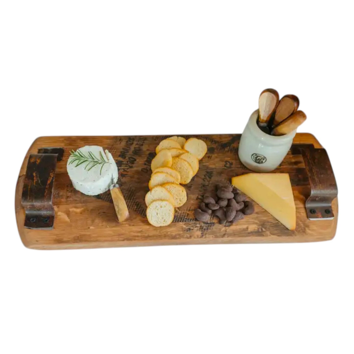 Round of herbed soft cheese topped with rosemary served on the reclaimed barrel Bourbon Head Cheese Tray.