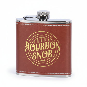 Front view of the "Bourbon Snob" flask featuring bold gold script.