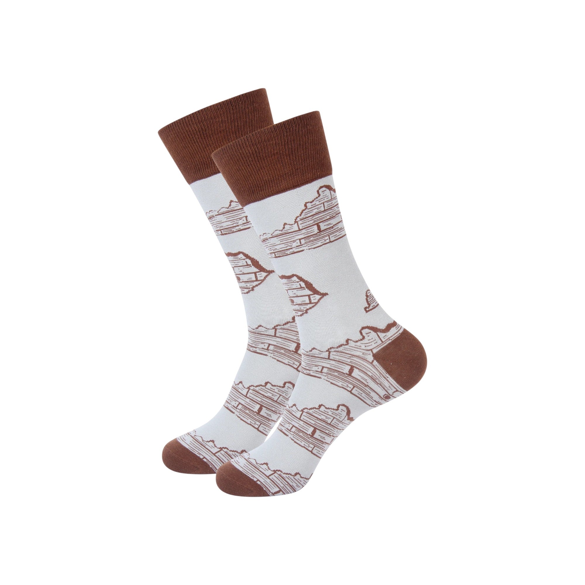 Pair of socks with architectural design and brown accents on a white background