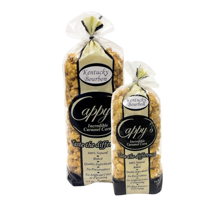 Two packages of Cappy's Incredible Caramel Corn with Kentucky Bourbon label on a white background