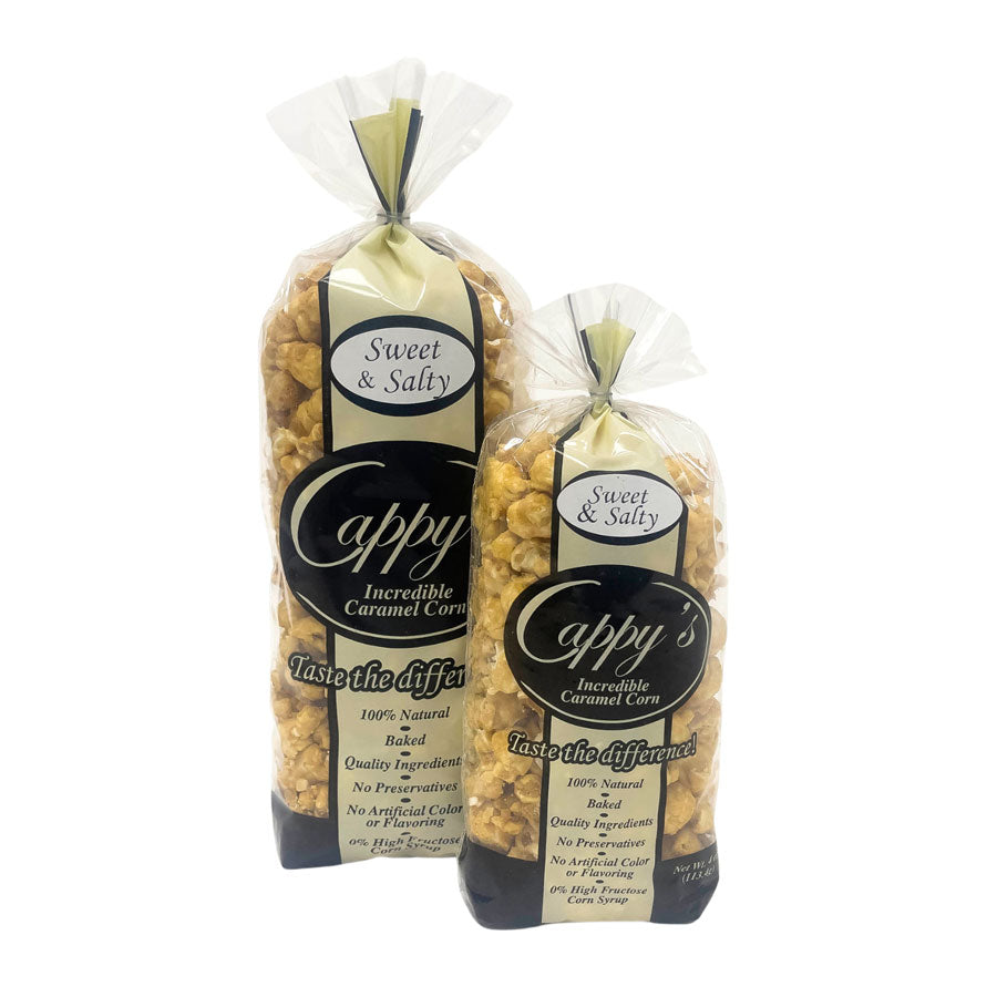 Two bags of Cappy Sweet & Salty caramel corn on a white background