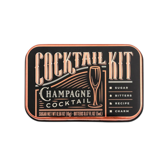 The Champagne Cocktail Kit inside its compact and stylish travel tin.