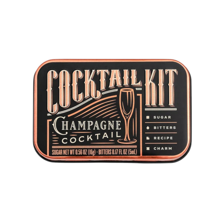The Champagne Cocktail Kit inside its compact and stylish travel tin.