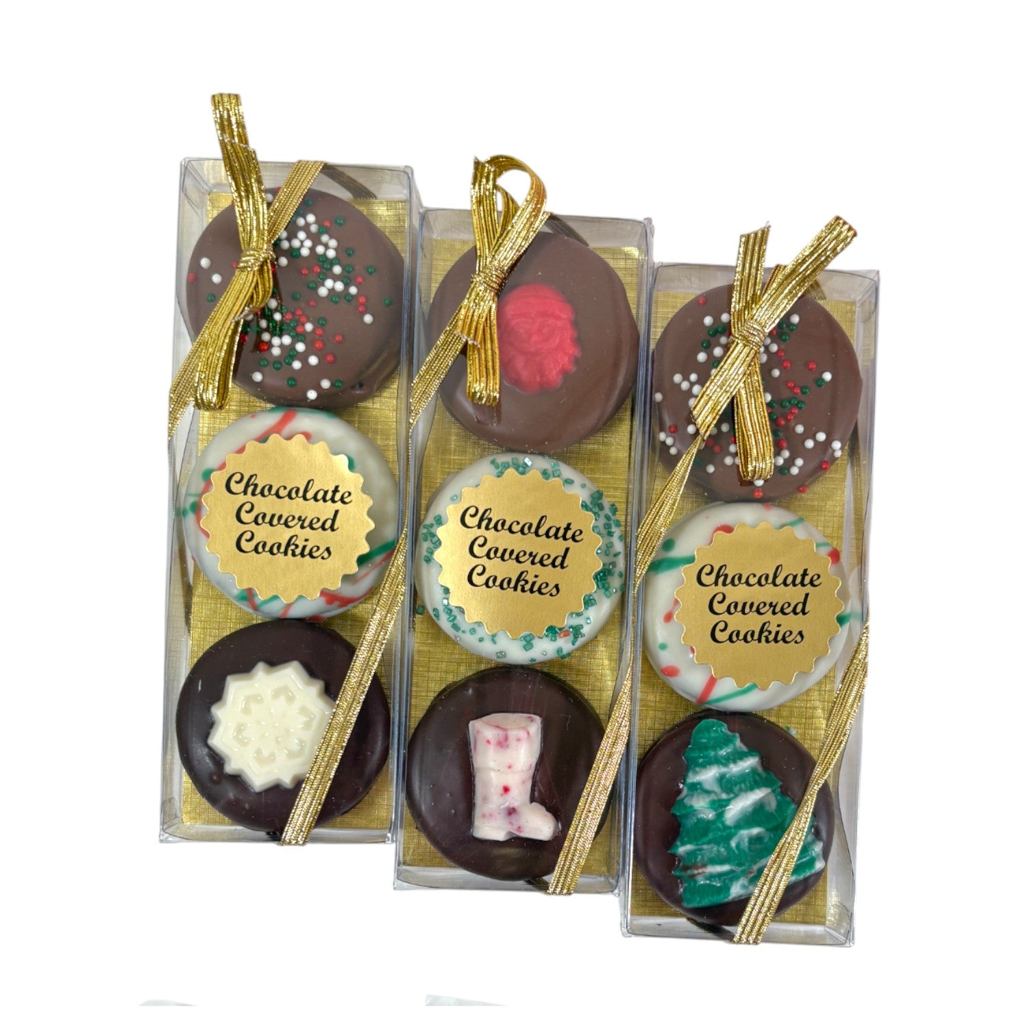 Three chocolate Oreos showing milk, dark, and white chocolate varieties with holiday decorations.