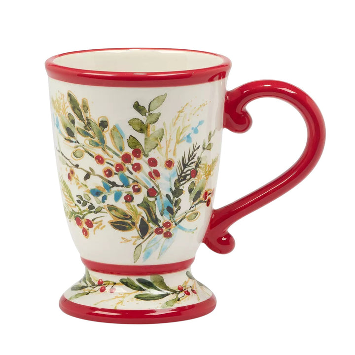 Decorative mug with floral design and red handle on a white background