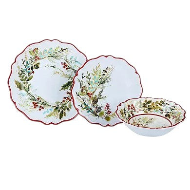 Set of ceramic plates with floral and berry design on a white background