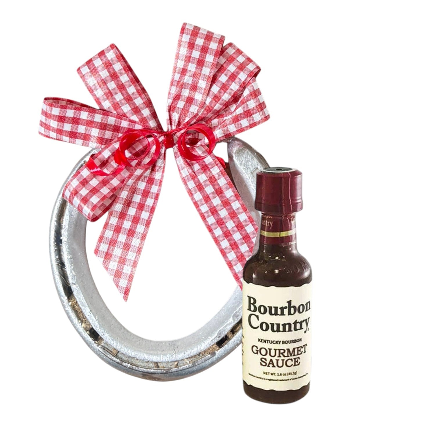 Genuine track horseshoe Derby gift paired with a mini bottle of Kentucky Bourbon Country Gourmet Sauce, finished with a handmade gingham bow.