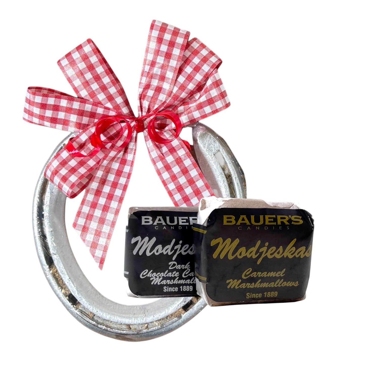 Genuine track horseshoe Derby party favor paired with classic Kentucky Bauer's Candies Modjeskas caramel marshmallow candy.