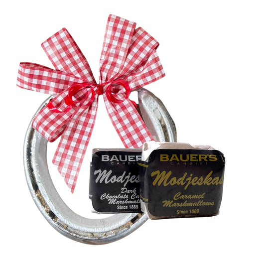 Genuine track horseshoe Derby party favor paired with classic Kentucky Bauer's Candies Modjeskas caramel marshmallow candy.