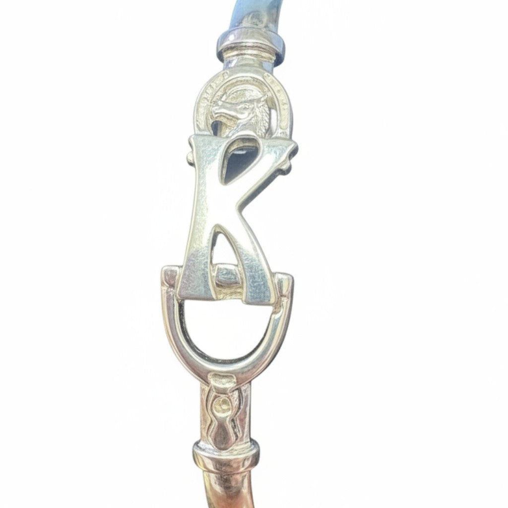 A close-up shot showing the intricate craftsmanship and clasp of a silver bracelet.