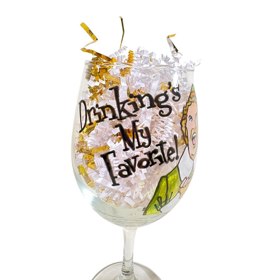 A close-up shot of the text "Drinking's My Favorite!" on the festive wine glass.