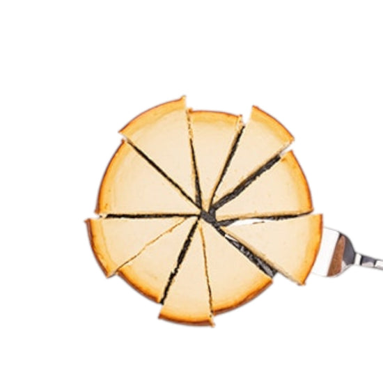 Round cake with slices cut out, showing layers on a white background