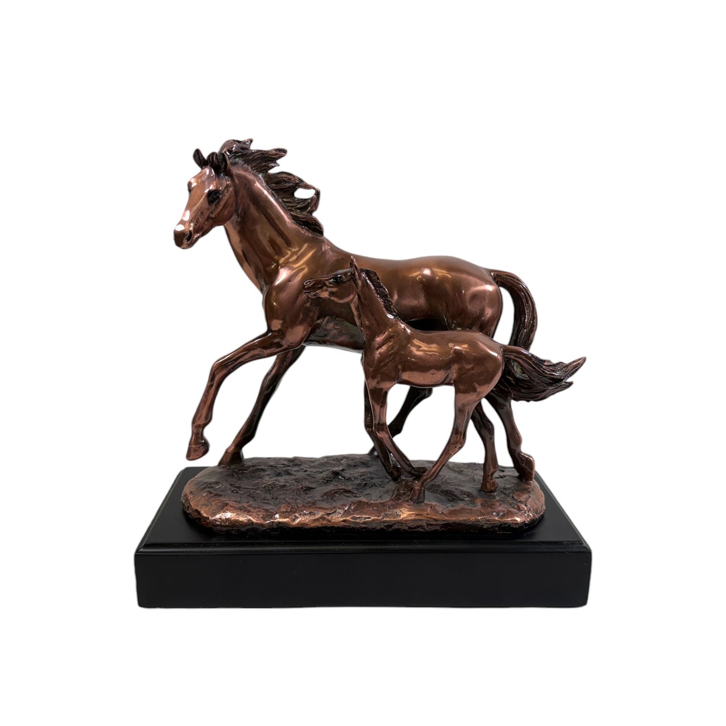 The dynamic copper Mom & Foal sculpture, showing the horses in a full run, displayed on a console table.
