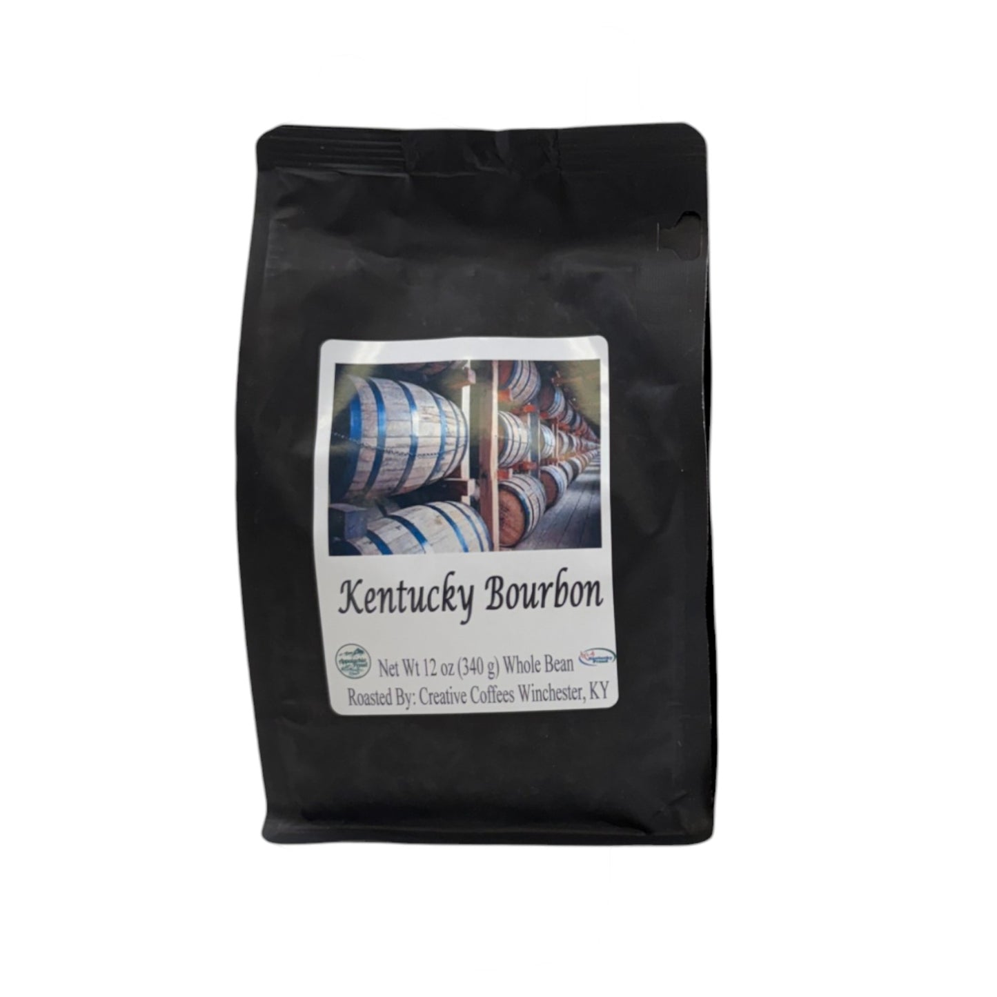 A detail shot of the 12oz bag of Kentucky Bourbon Whole Bean Coffee included in the gift box.
