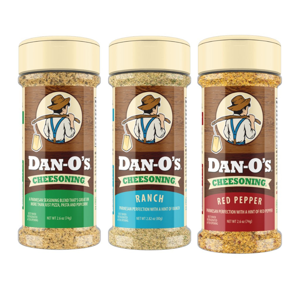 Three jars of Dan-O's Cheesening on a white background