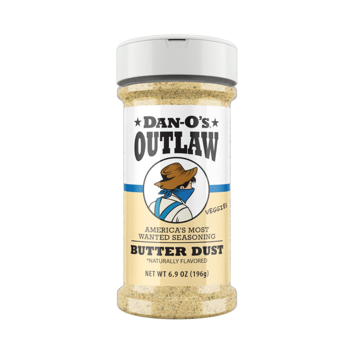 A medium bottle of Dan-O's Outlaw Butter Dust Seasoning featuring the cowboy mascot on the label.
