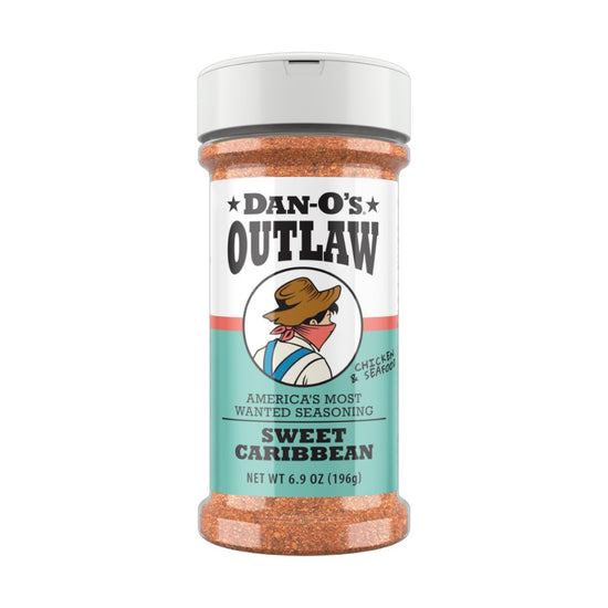 A medium-sized bottle of Dan-O's Outlaw Sweet Caribbean Seasoning on a white background.