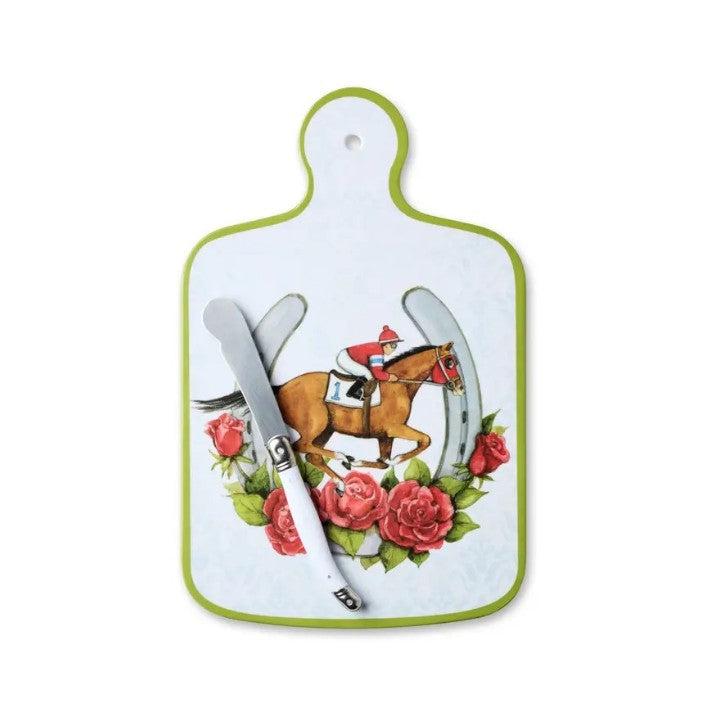 A top-down view of the "Day at the Races" melamine cheese board with its matching knife, showcasing the vibrant horse, jockey, and rose design on a white background.