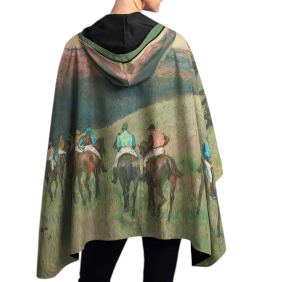 Cape with horse racing scene print on a white background