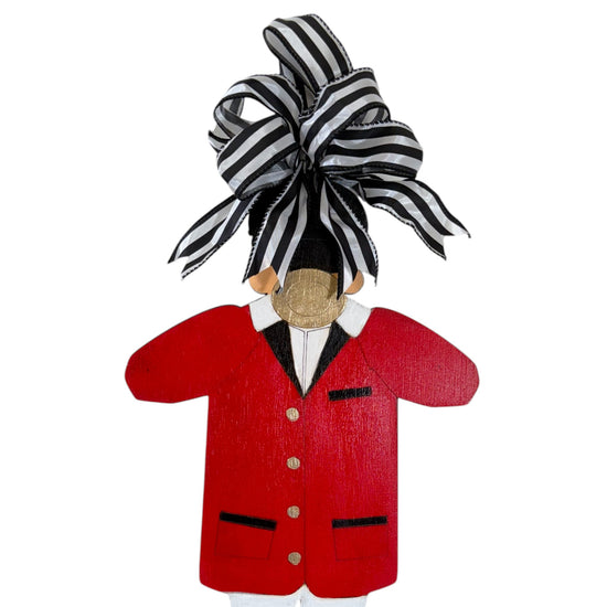 Decorative figure with a red jacket and black and white striped bow on a white background
