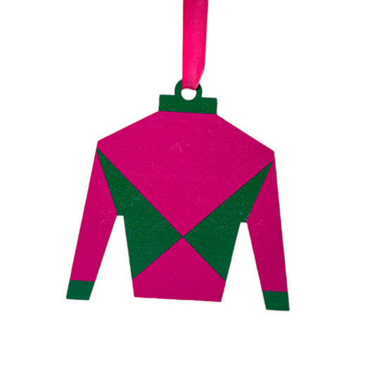Pink and green jockey's silks on a white background
