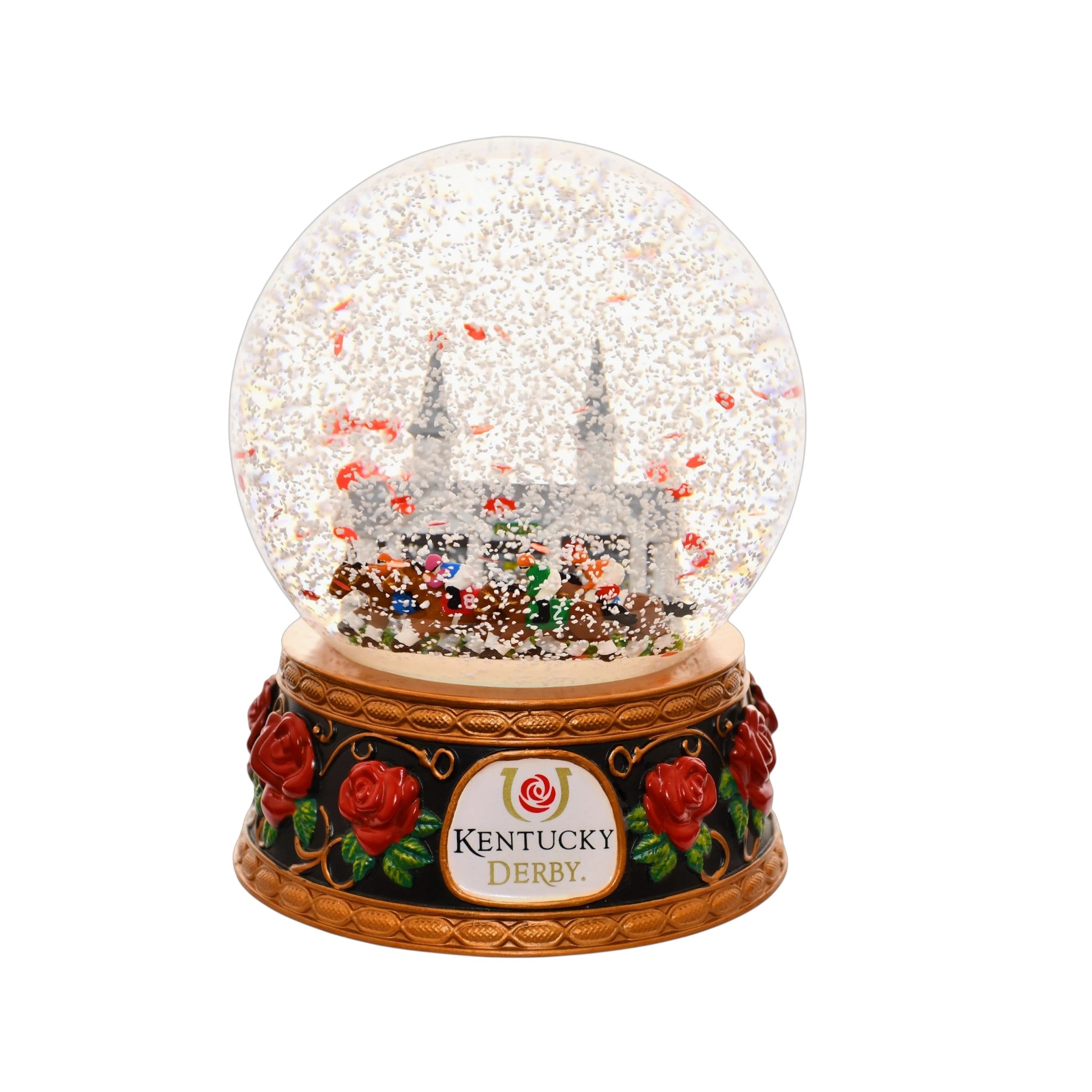 A close-up of the Kentucky Derby snow globe, with snow and red rose petals swirling around the racehorses.