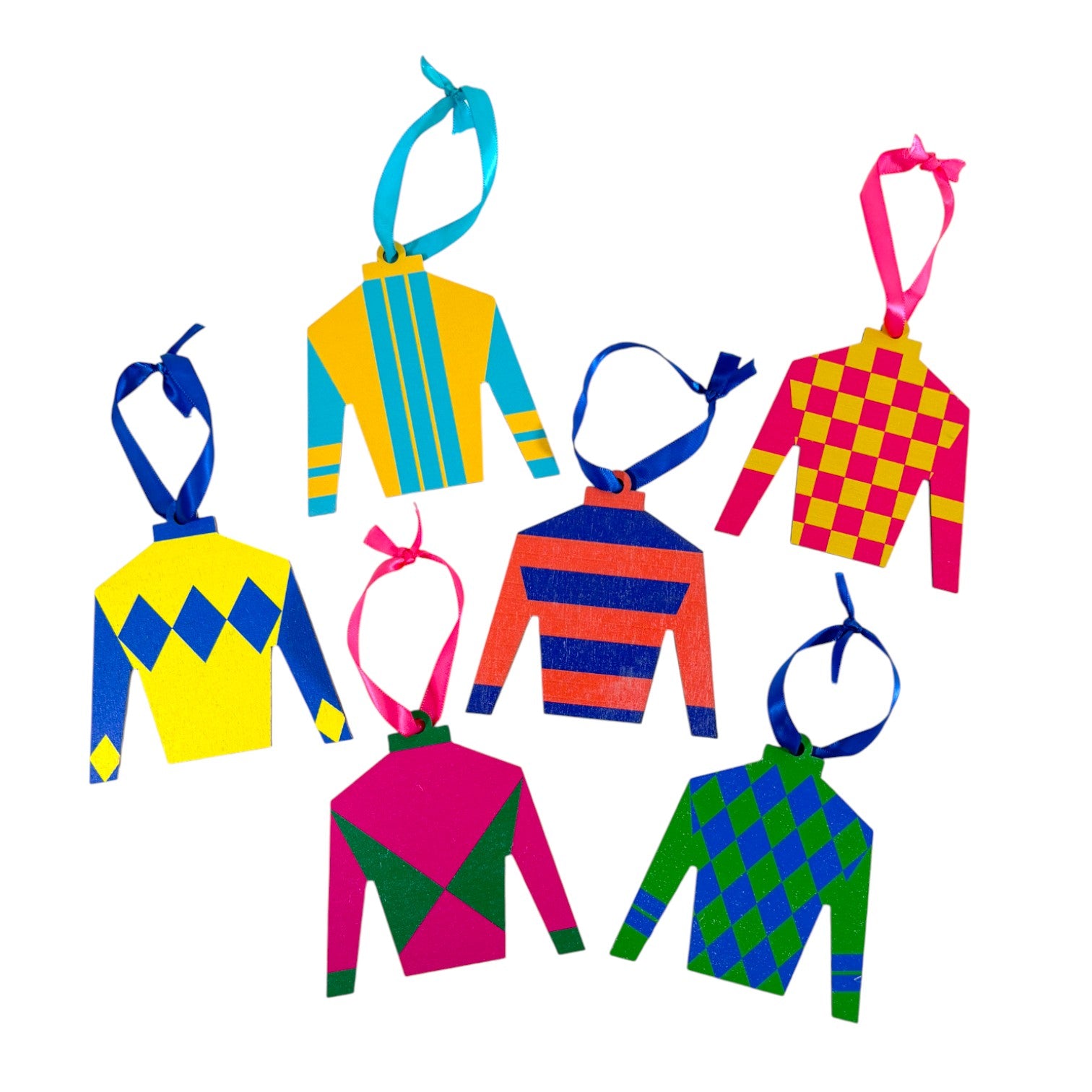 Colorful jockey silks wooden holiday ornaments with various patterns on a white background