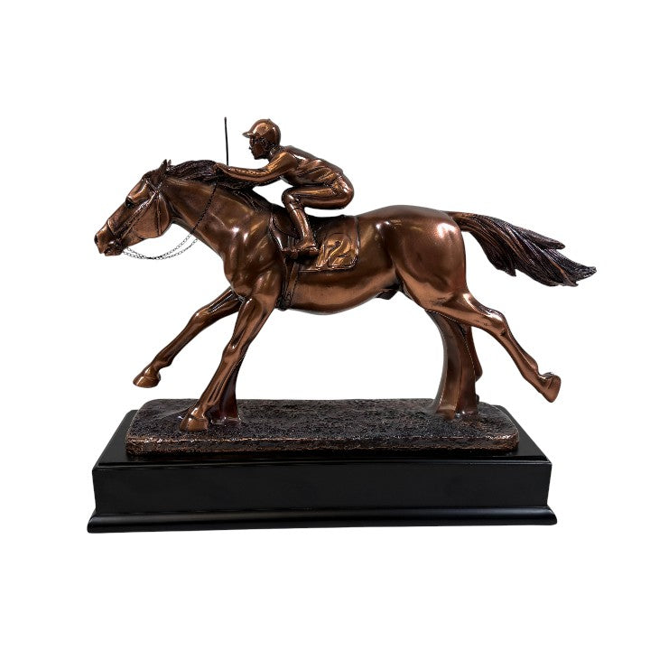 Copper plated sculpture of a horse and rider on a black base