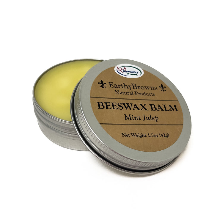 Beeswax balm in a metal tin with a brown label on a white background