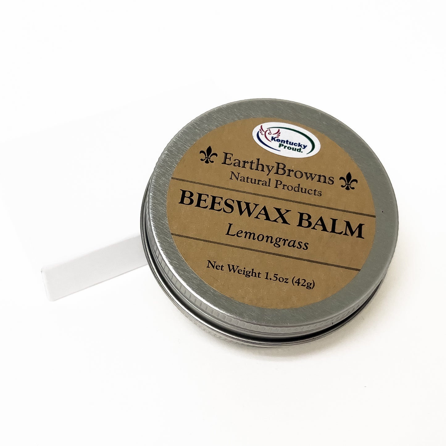 Beeswax balm container with 'Earthy Browns' label on a white background