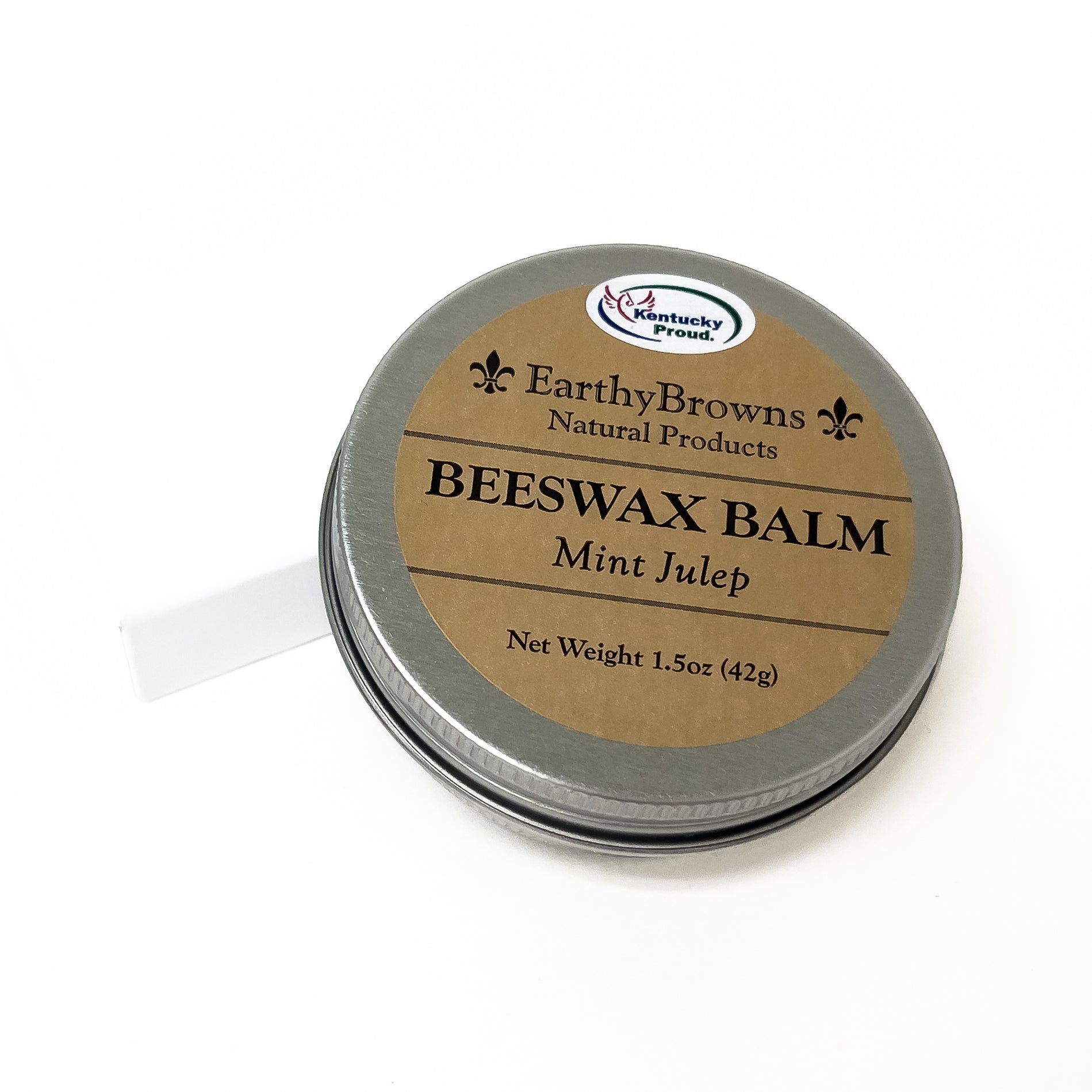 Beeswax balm tin with 'Earthy Browns' label on a white background