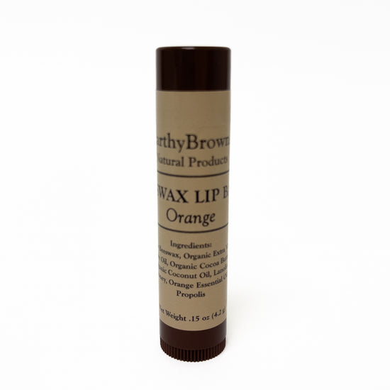 Wax lip balm with 'Earthy Brown' branding on a white background