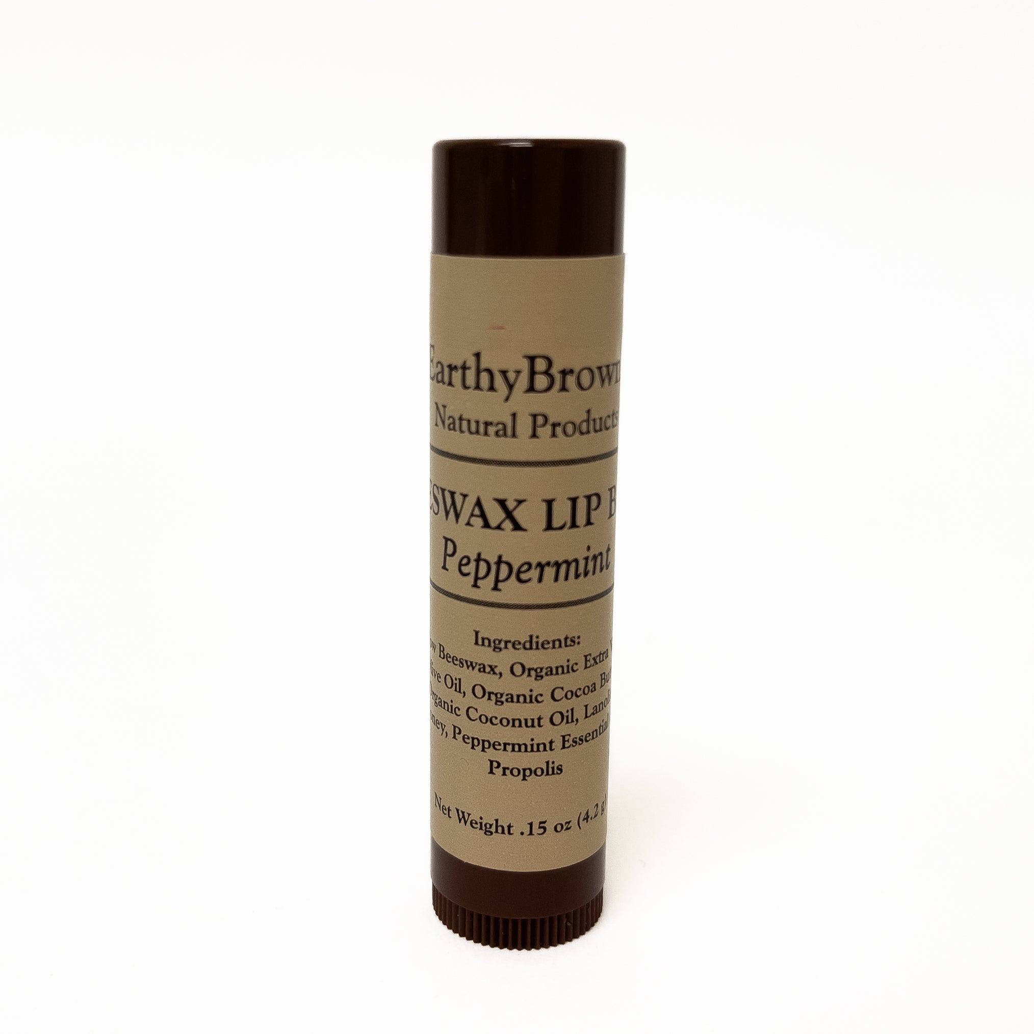 Beeswax lip balm stick with 'Earthy Brown' branding on a white background