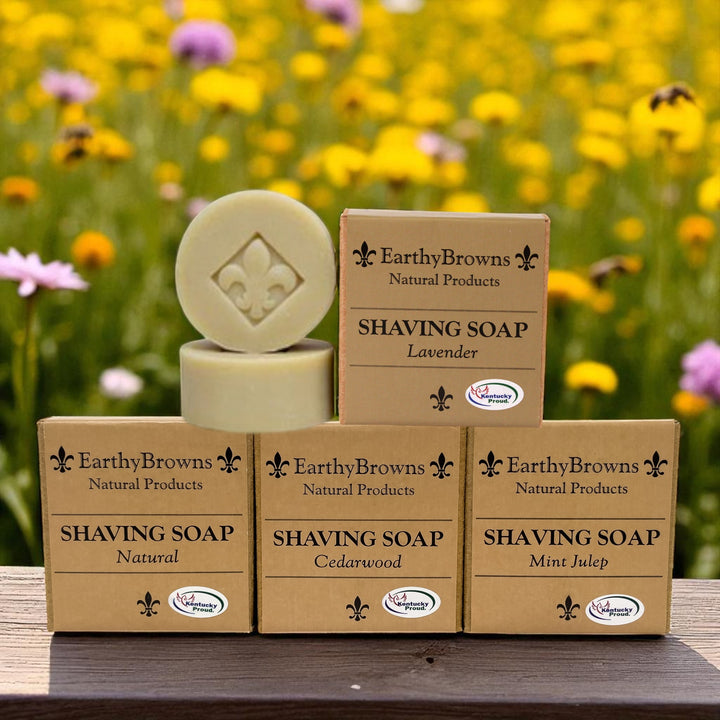 Earthy Browns natural products shaving soap with boxes on a wooden surface against a floral background