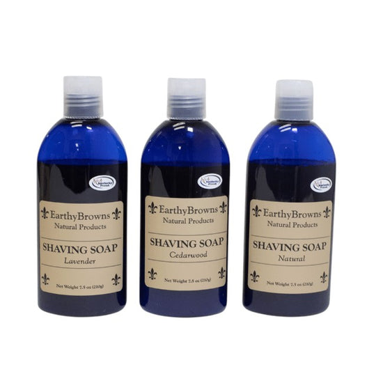 Three bottles of Earthy Browns Shaving Soap on a white background