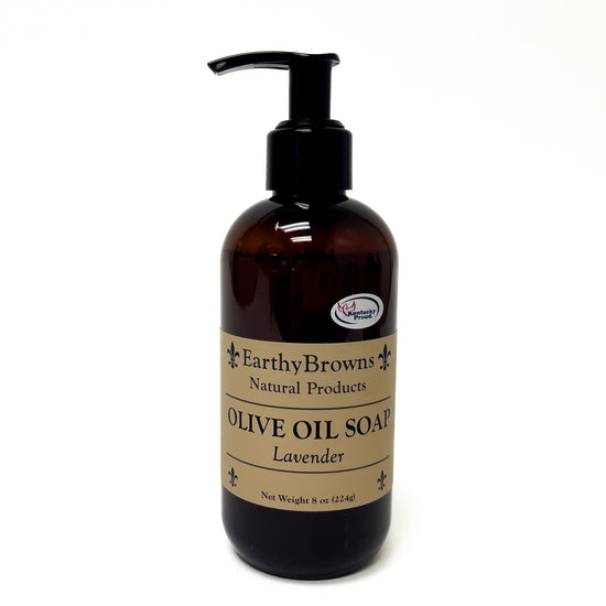 Brown bottle of Earthy Browns Olive Oil Soap with pump on a white background