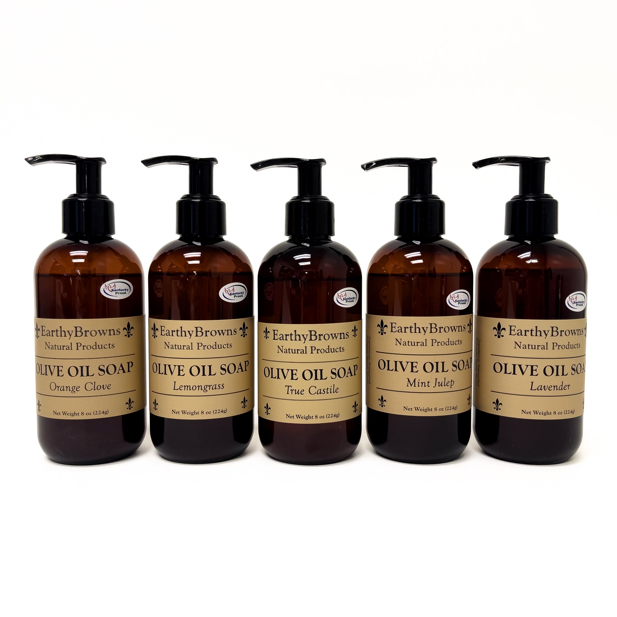 Set of five Earthy Browns Olive Oil Soap bottles with labels on a white background