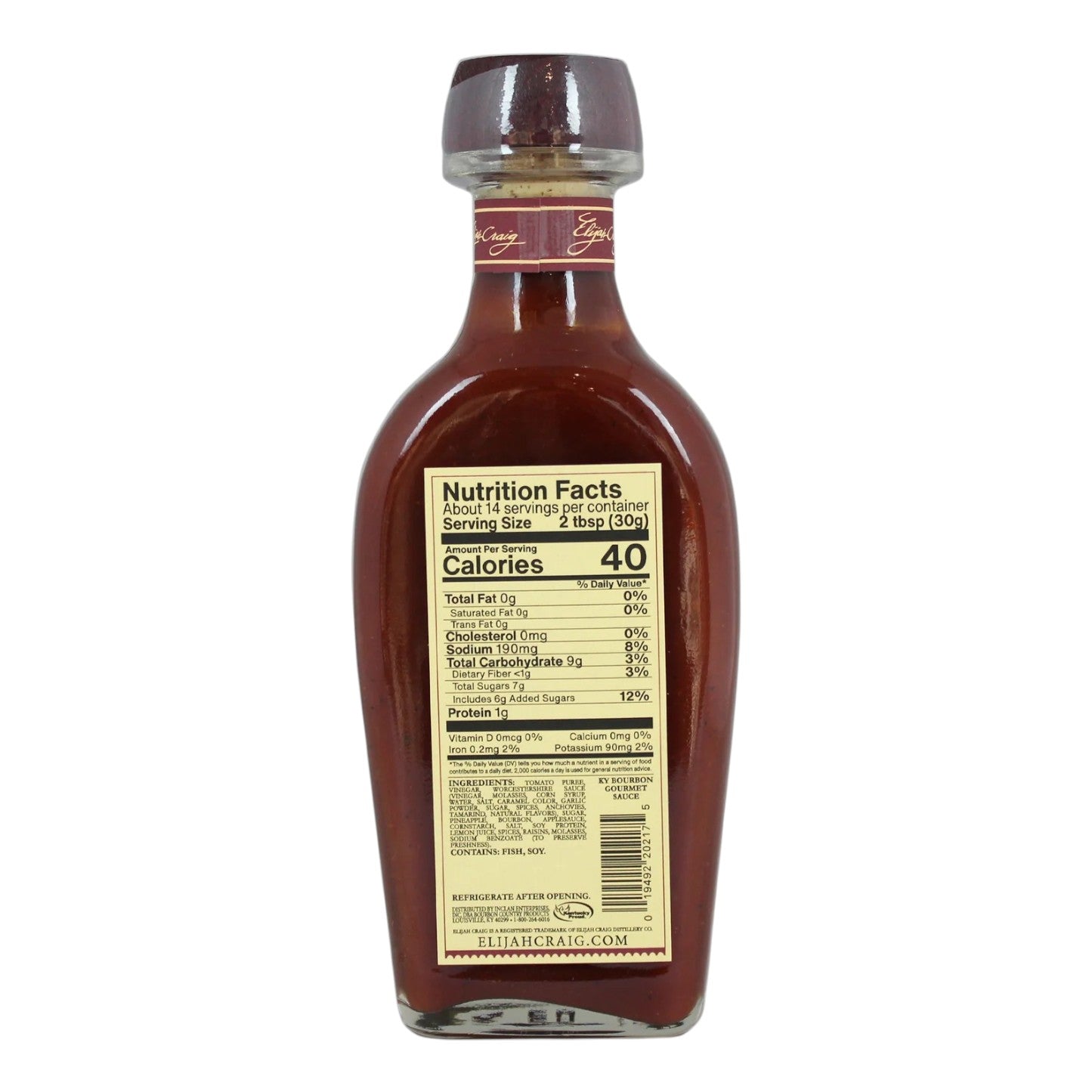 Bottle of syrup with nutrition facts label on a white background