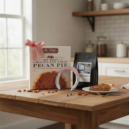A cozy lifestyle scene of someone enjoying a slice of Bourbon Pecan Pie with a freshly brewed cup of Kentucky Bourbon coffee.