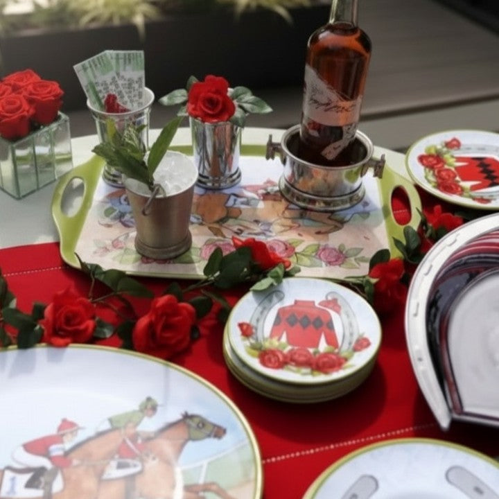 A lifestyle photo of the 'Day at the Races' canape plates being used to serve small appetizers at a festive Derby-themed party.