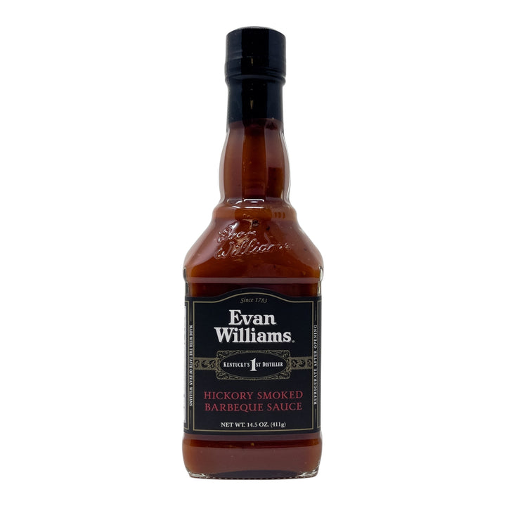 Bottle of Evan Williams hickory smoked barbecue sauce on a white background
