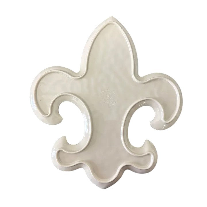 The back of a Fleur-de-Lis melamine plate showing the dishwasher-safe care instructions.