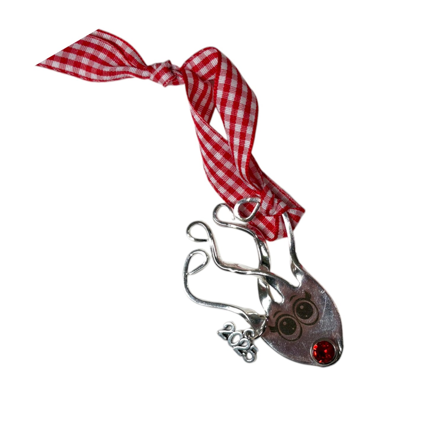 Close-up of the Girl Reindeer ornament, showing the delicate hand-stamped eyelashes.