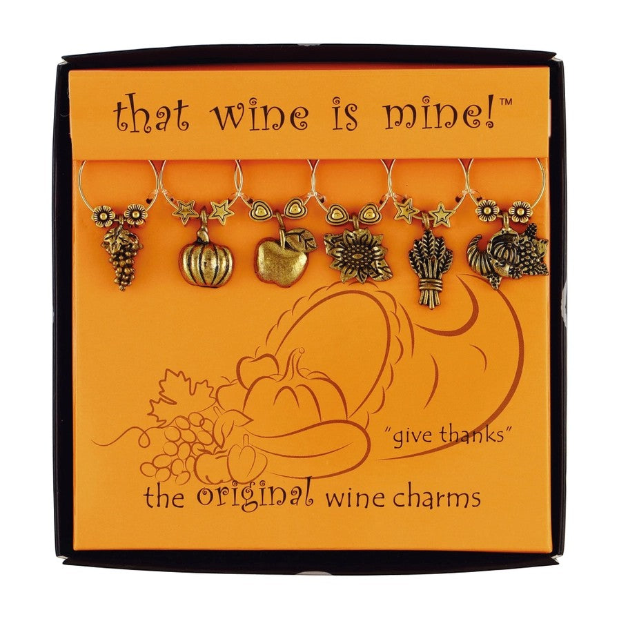 Six antique gold-tone wine charms in an orange Thanksgiving gift box, featuring harvest motifs.