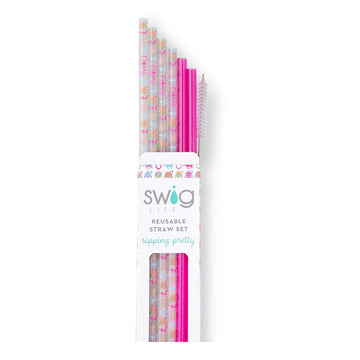 Packaged set of reusable straws with colorful patterns and pink accents, branded 'Swig'.