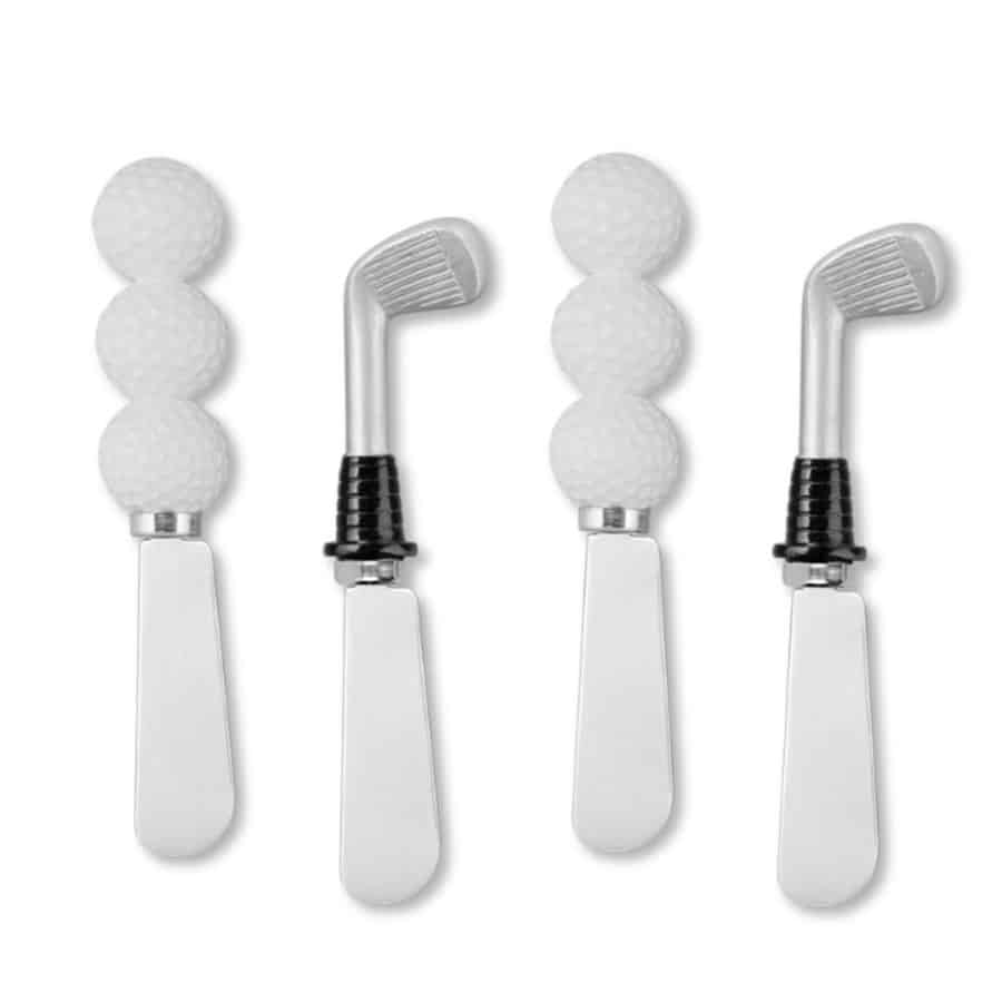 Set of four white and silver cheese knives on a white background