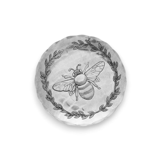 A top-down view of the handcrafted aluminum Honey Bee Coaster, showcasing the detailed bee design.