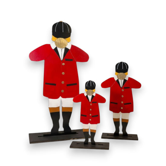A hand-painted wooden bugler figurine in a traditional red coat and black riding hat, standing on a black base.