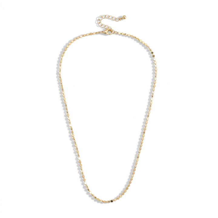  Full view of the Harper Mini Disc Charm Necklace Base in shiny gold, showing the shimmering disc links and adjustable chain on a white background.