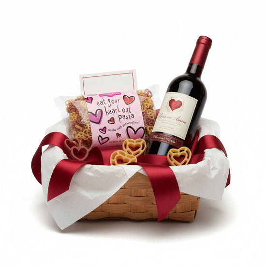 A gift set idea featuring Eat Your Heart Out Pasta and a bottle of red wine.